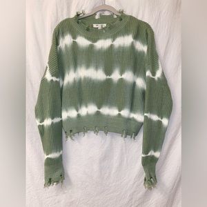 Frayed green and white sweater